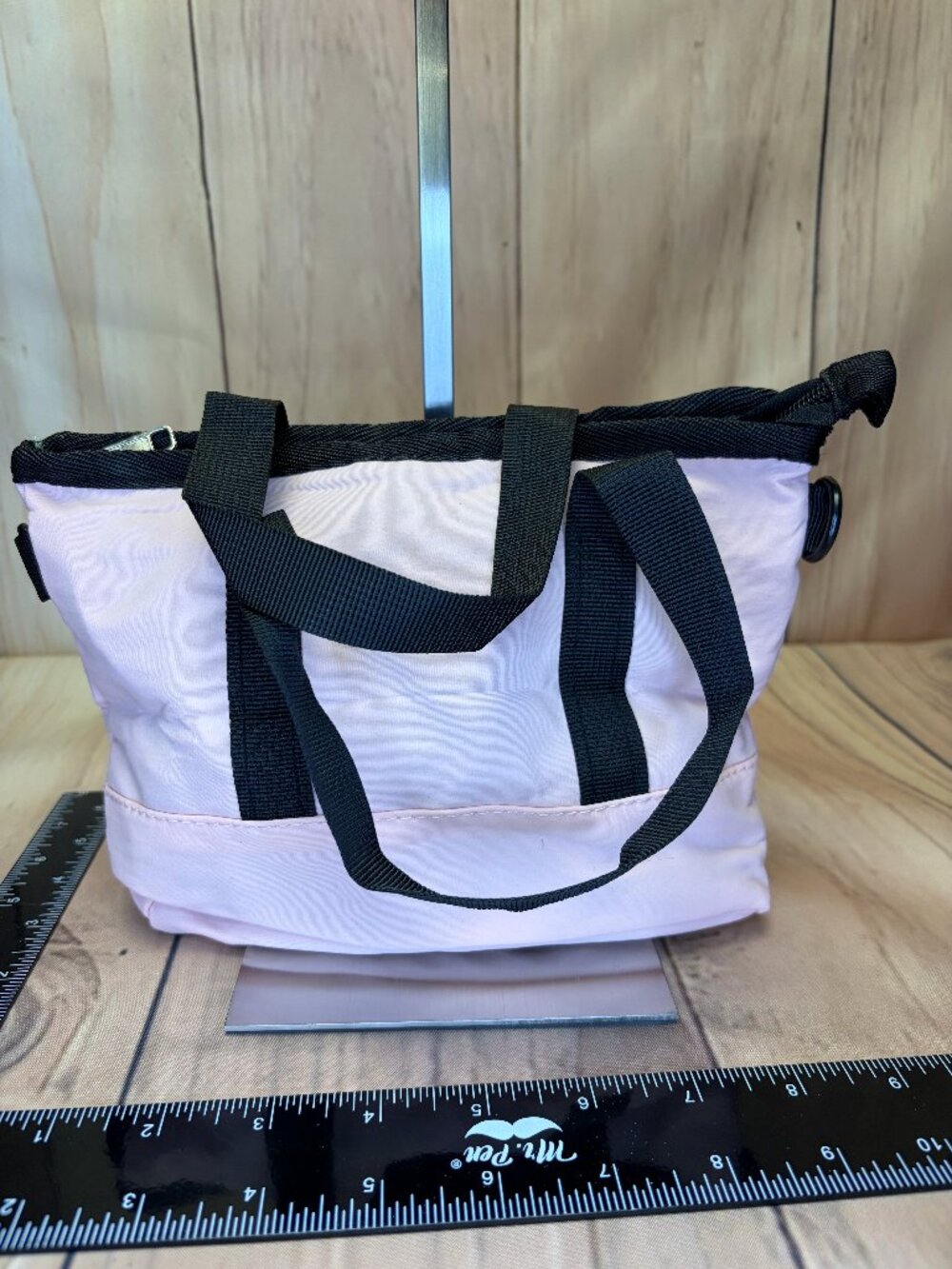 Light pink mini crossbody tote bag with canvas material